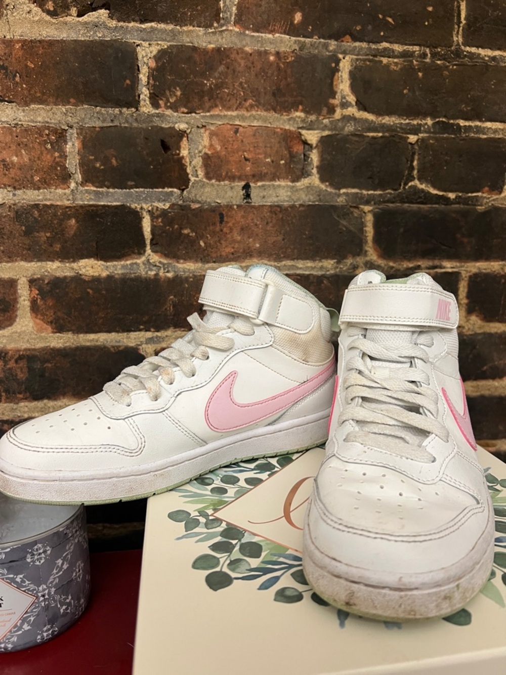 Nike White High-Top Sneakers with Pink Swoosh Accents